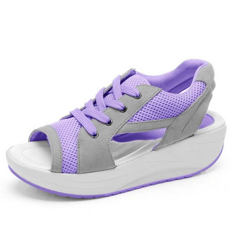 Women's purple lace-up sports sandals with thick sole offering comfort and breathability, featuring air mesh upper and durable rubber outsole.